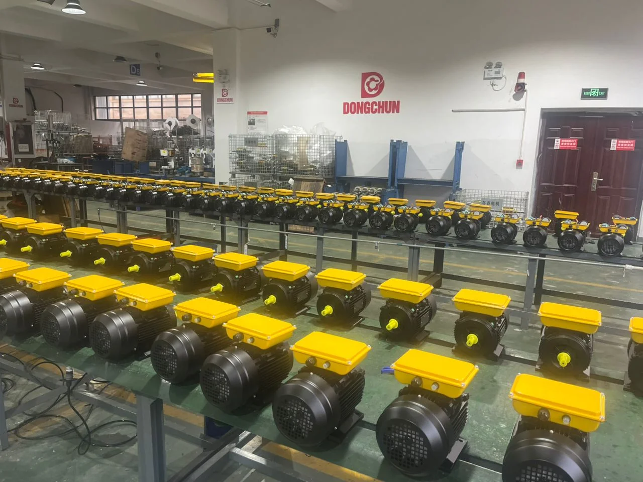 Buyer photographing motor nameplate and measuring weight for quality dispute documentation Procurement officer documenting motor specifications for quality complaint